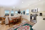 Whether you are cooking or playing cards at the dining room table or watching TV, you will always have amazing views.